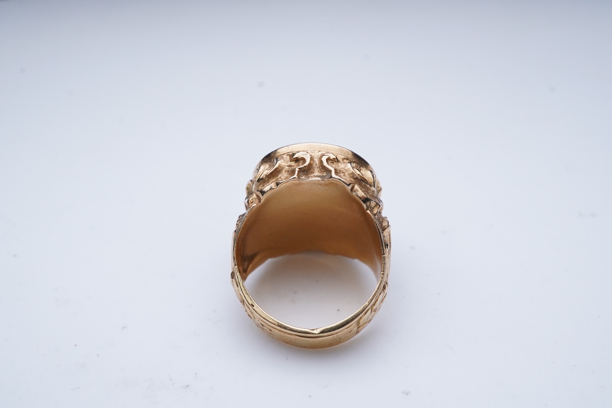 A gold peso coin ring